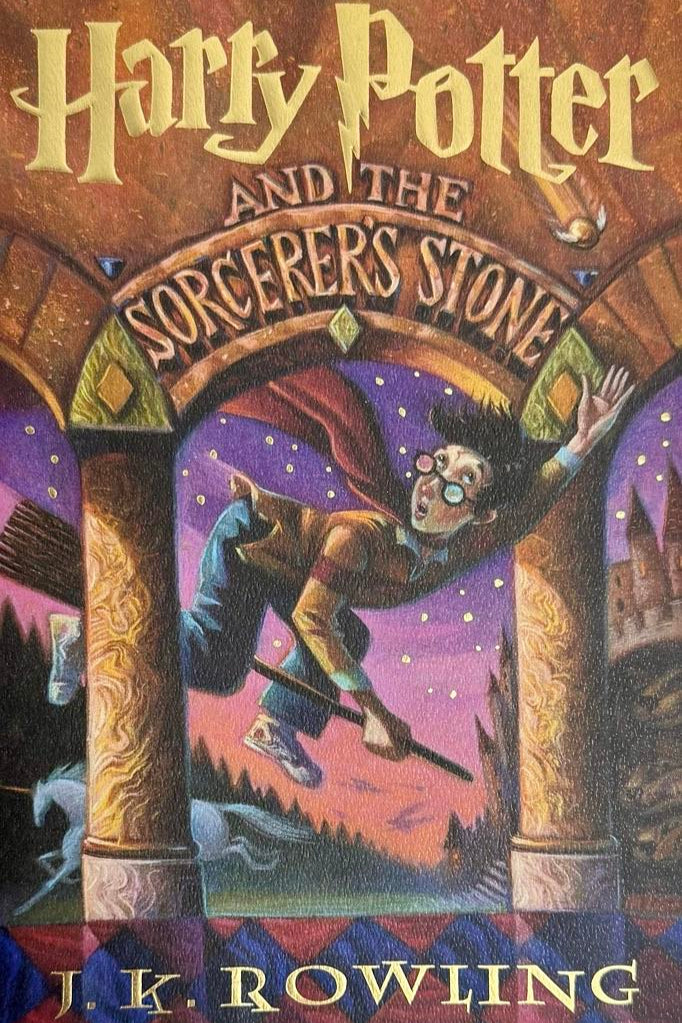 Daniel Radcliffe Autographed Book Sorcerer's Stone - Beckett COA